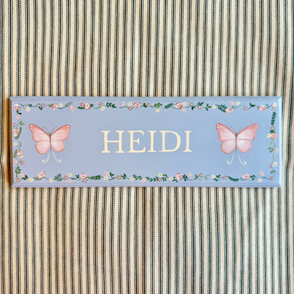 Personalised hand-painted wooden bedroom door plaque with decorative illustrations