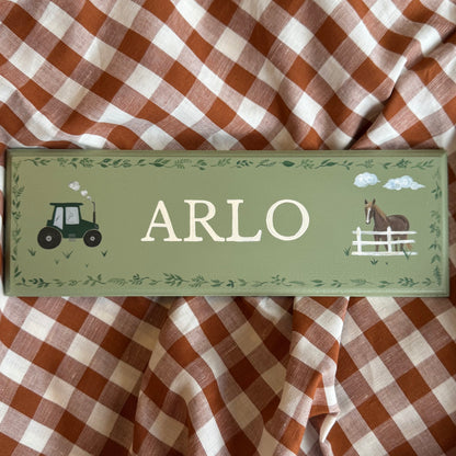 Personalised hand-painted wooden bedroom door plaque with decorative illustrations