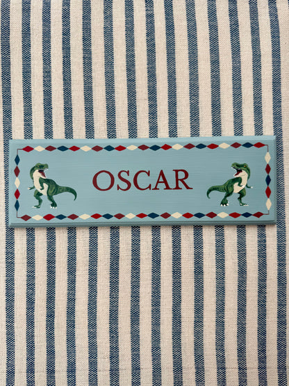 Personalised hand-painted wooden bedroom door plaque with decorative illustrations