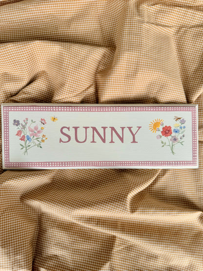 Personalised hand-painted wooden bedroom door plaque with decorative illustrations