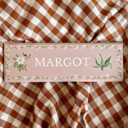 Personalised hand-painted wooden bedroom door plaque with decorative illustrations