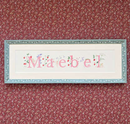 Bespoke hand-painted full name watercolour painting in a decorated oak frame