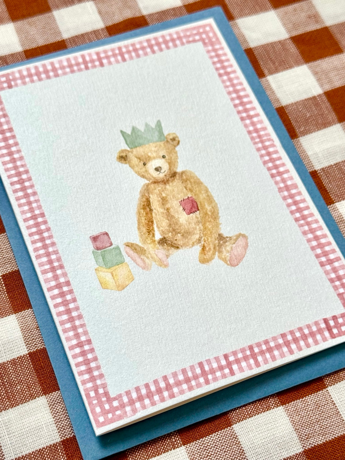 green teddy greetings card, angled photograph